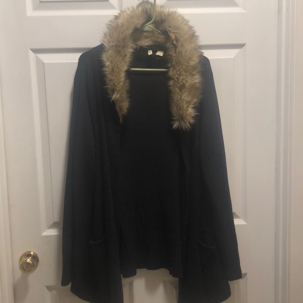 Ladies wool jacket with removable fur collar.